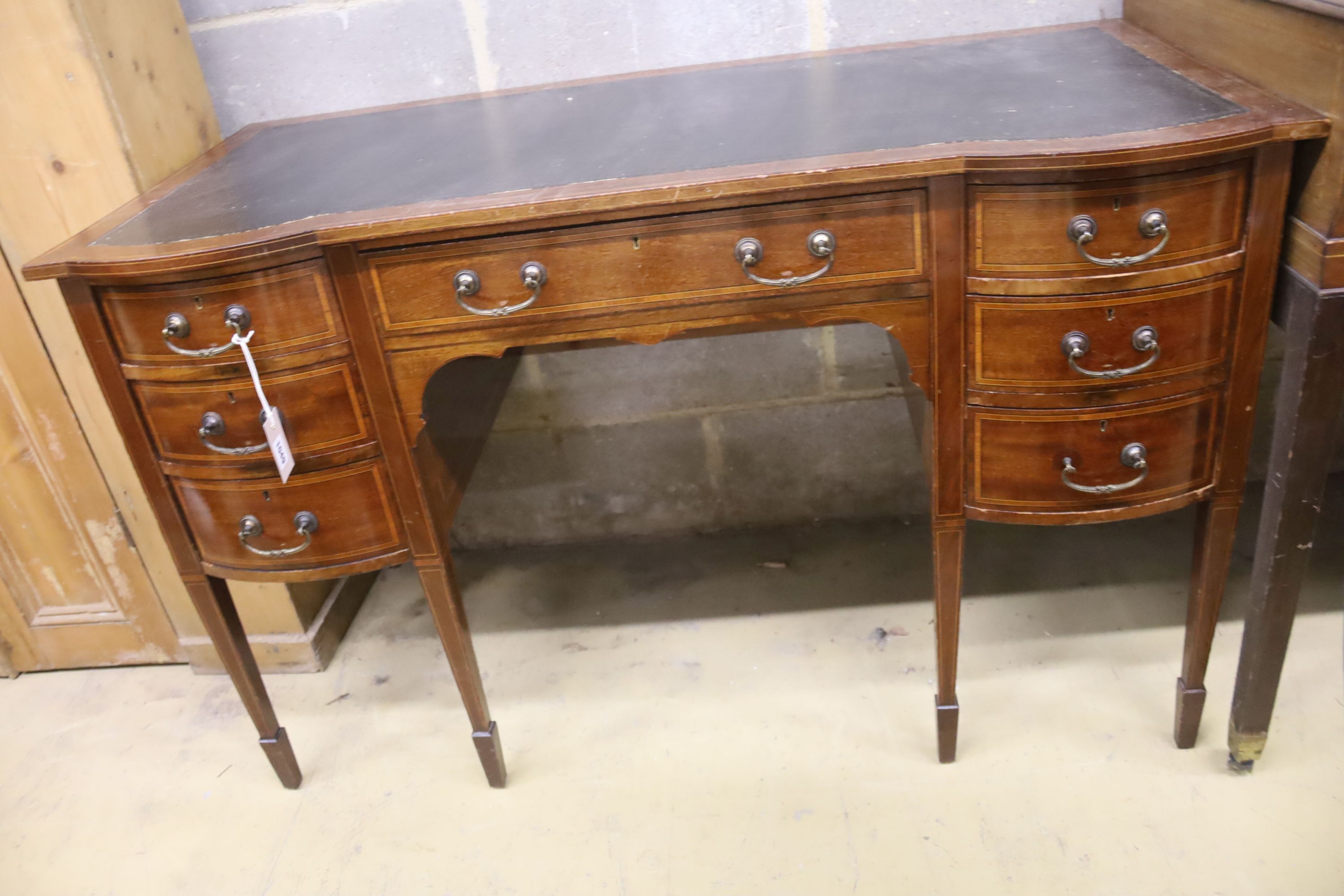 An Edwardian satinwood banded mahogany kneehole desk, width 121cm, depth 60cm, height 76cm
